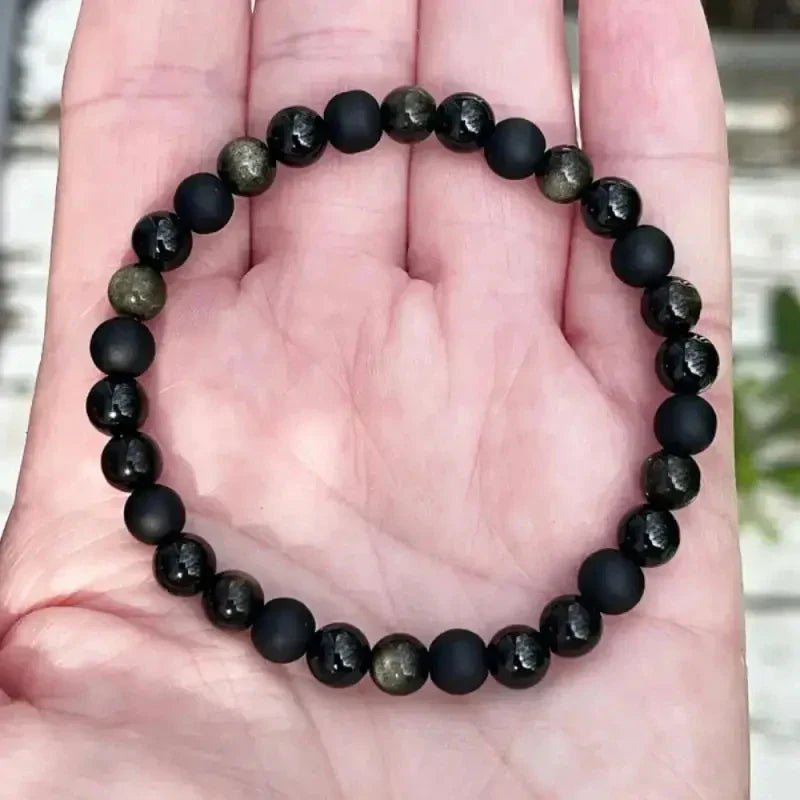 Armband mit matten und glänzenden Perlen in Schwarz
